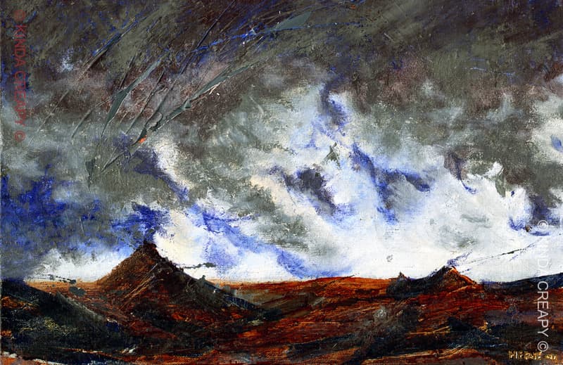 Paysage avec un ciel menaçant au-dessus de terres rouges.